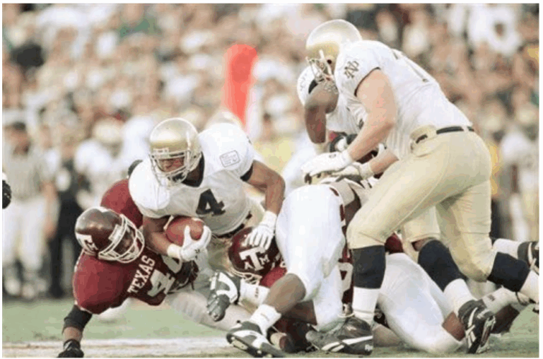 Lee Becton rushing in 1994 Cotton Bowl, Notre Dame VS Texas A&M. Photo Credit: Eric Gay